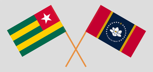 Crossed flags of Togo and the State of Mississippi. Official colors. Correct proportion