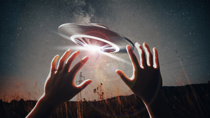 UFO hovering over hands in forest at night – science fiction alien encounter – 3D concept illustration © guteksk7