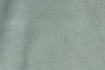 Ash gray textured suede leather surface background