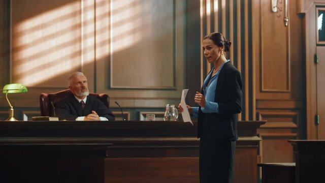 Court of Justice and Law Trial: Successful Female Public Defender Presenting the Case, Making Passionate Speech to Judge, Jury. Attorney Lawyer Protecting Client with Closing Not Guilty Arguments.