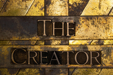 The Creator text on vintage textured copper and gold background