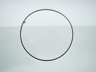 Fly sit close up of a closed petrol cap cover on a white car