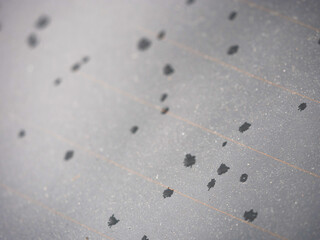 First water drops on car window shield when rain beggins