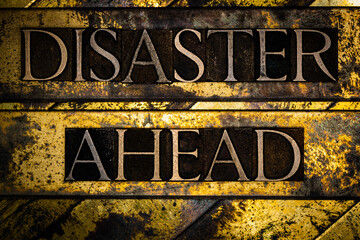 Disaster Ahead text on vintage textured grunge copper and gold steampunk background