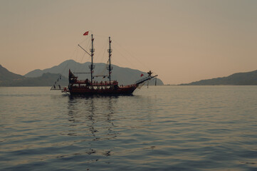 Fototapeta na wymiar Evening in the Aegean Sea. Sunset. Boat trip near Marmaris. Turkey
