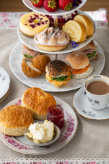 Afternoon tea with scones, cakes and sandwiches