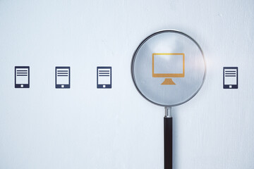 Magnifier zooming in on computer icon on white background. Digital transformation and online search engine concept. 3D Rendering.