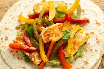 Tasty Halloumi cheese Fajitas with tortilla mix pepper and guacamole. Healthy food