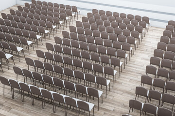Fototapeta premium Top view of auditorium seats on wooden floor. 3D Rendering.