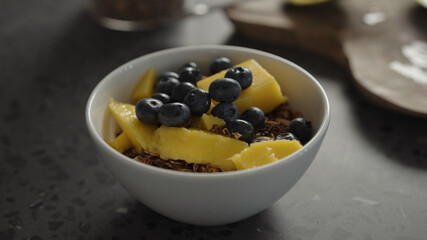 mango and blueberries granola with yogurt