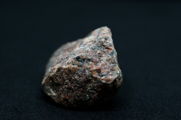Fototapeta premium mineral stone isolated on black