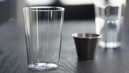 Making espresso tonic in tumbler glass, put ice ball