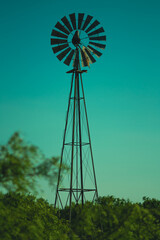 Macro still shot of a rustic windmill on an old country ranch 