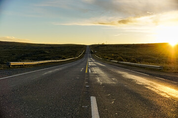 Fototapeta na wymiar view of a mountain road at sunset