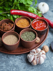 Pepper,paprika, basilik.Georgian food. Georgian spices on a plate.	