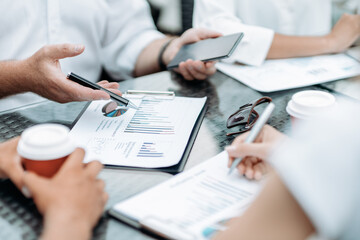 businessman discussing financial documents with his colleague. c