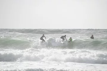 Foto op Aluminium surfer on the beach © Laurence