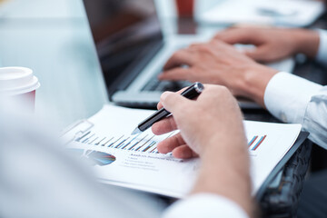 image of a group of business people checking financial data .