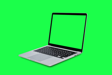 Laptop computer with blank green screen isolated on green background.
