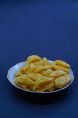 Jackfruit on a plate with a dark background