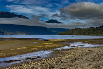 River and sea under the mountains