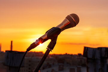 Microphone on the stand is prepared for recording song and video clip, or for outdoor musical show,...