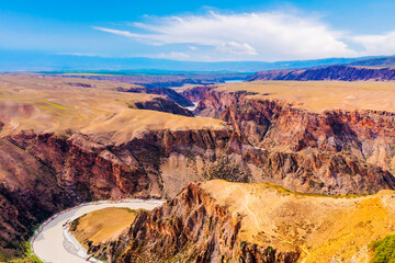 Fototapeta na wymiar The spectacular geological landscape of the Kuokesu Grand Canyon,Xinjiang,China.Aerial view.