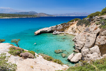 Beautiful clear, warm ocean and dry, summer coastline at Voulisma, Crete, Greece