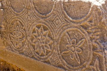 Ancient inscriptions on a stone slab at the ruins of Itanos on Crete, Greece