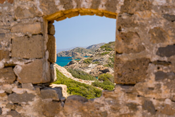 Fototapeta na wymiar Remains of buildings and structures at the ancient Doric settlement of Itanos on the coast of Crete
