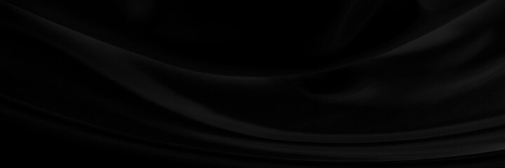 Black gray satin dark fabric texture luxurious shiny that is abstract silk cloth panorama background with patterns soft waves blur beautiful.