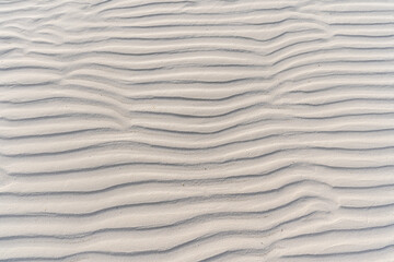 Close up of patterns and textures in sand - background top view