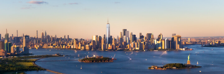 New York City Manhattan Skyline with Freedom Tower at Sunset