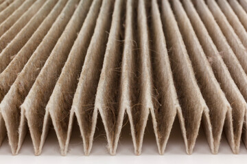 Close up macro very dirty used air filter background. Old dirty air filter car.