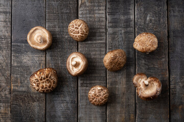 Fresh Shiitake Mushroom on wooden background