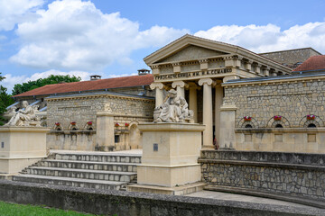 Fototapeta premium View of the building with inscription 'The Semashko mud baths' and sculptures in the city of Essentuki, Russia, built in 1913 in the ancient Greek style
