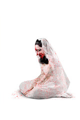Spooky bride ghost with bloody wound sit on studio