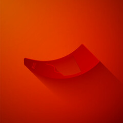 Paper cut Hunting horn icon isolated on red background. Paper art style. Vector