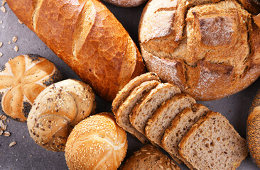 Assorted bakery products including loafs of bread and rolls