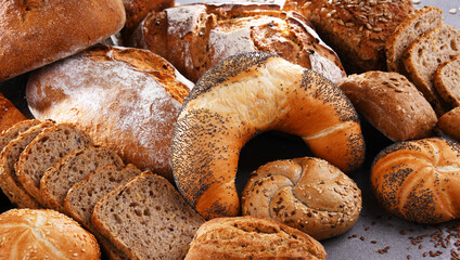 Assorted bakery products including loafs of bread and rolls