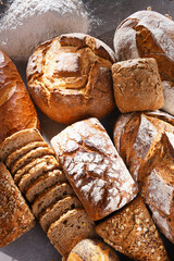 Assorted bakery products including loafs of bread and rolls