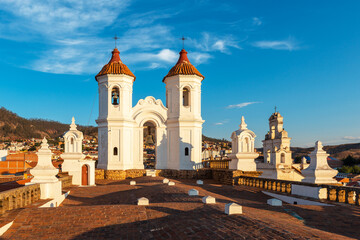 Sucre city sunset from San Felipe Neri church monastery with clock towers, Sucre Department,...