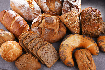 Assorted bakery products including loafs of bread and rolls