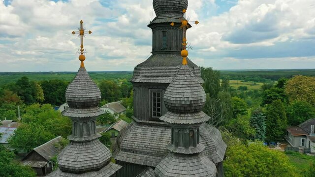 Rural landscape flying around the old wooden church.