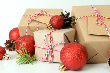 Gift boxes and Christmas accessories on white table