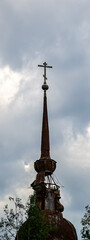 Fototapeta na wymiar the sharp spire of the Orthodox bell tower