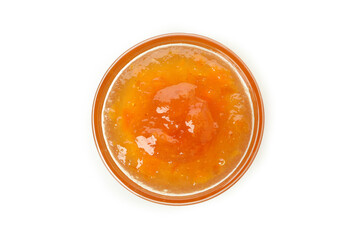 Bowl of peach jam isolated on white background