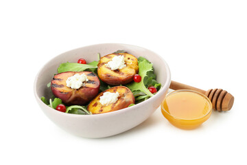 Salad with grilled peach isolated on white background