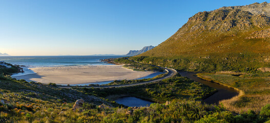 The wonderfully scenic R44 Clarence Drive along the eastern shores of False Bay crosses the Rooiels River Estuary. Rooi-Else, near Cape Town, Western Cape. South Africa