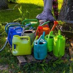 water cans in a backyard